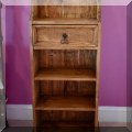 F33. Wooden shelf with iron drawer pull. 